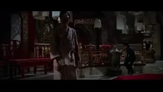 man in robe in ornate temple — Bruce Lee: Enter The Dragon