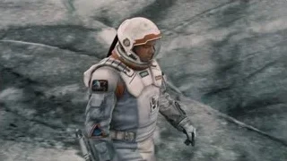 Man in space suit holding gun on rocks — Interstellar