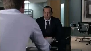 Man in suit at modern office desk — Suits