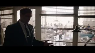 Man in suit in office with Cobra sign — Ford v Ferrari