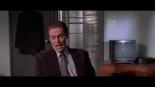 man in suit in office with window — American Psycho