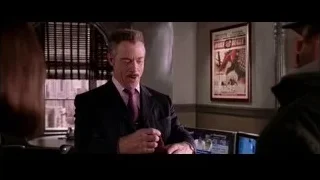 Man in suit laughing holding Spiderman suit — Spider Man 2