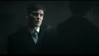 man in suit looking in dark room mirror — Peaky Blinders