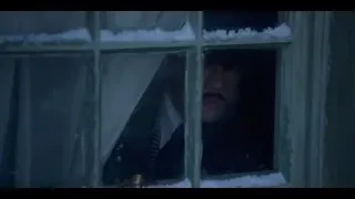 man in suit looking out snowy window — Peaky Blinders
