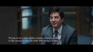 man in suit sitting on office couch — The Big Short