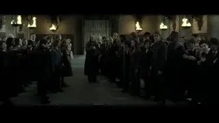 Man in suit standing in church hallway — Harry Potter and the Deathly Hallows 2