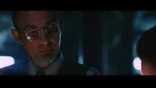man in suit with serious expression — Iron Man