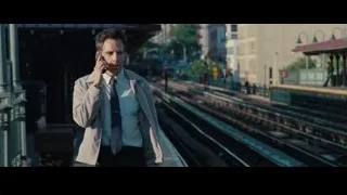 Man in trench coat on train platform — The Secret Life of Walter Mitty