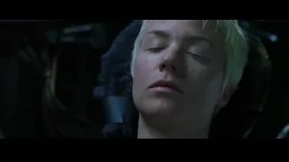 man looking at woman's face on monitor — The Matrix
