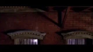 man standing in brick doorway — Spider Man 2