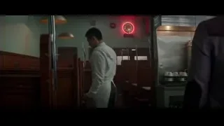 man standing in dimly lit room — Bruce Lee: Birth of The Dragon