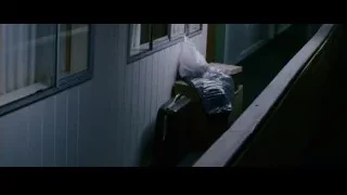 Man walking down hallway with bag — The Persuit of Happyness