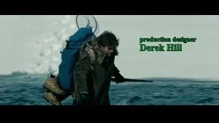 man walking on water holding fishing net — Into the Wild