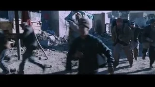 Man walking through rubble-strewn street — Iron Man
