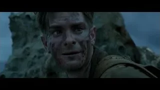 Man with bloody face on rocky cliff — Hacksaw Ridge