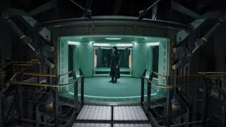 man with gun in futuristic room — The Avengers