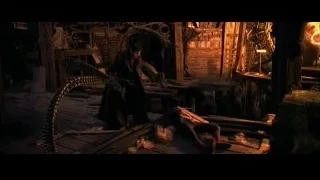 man with large snake coiled around him — Spider Man 2