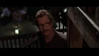 man with mustache on wooden staircase — Batman