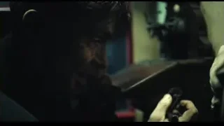 man's face holding phone in dim room — Peaky Blinders