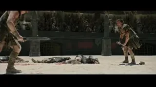 Men in Roman armor fighting in arena — Gladiator 2