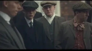 men in suits and hats standing by brick building — Peaky Blinders