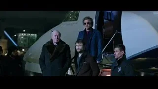men on stage with microphone — Now You See Me 2