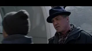 men standing in front of white van — Creed