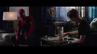 Miles Morales in Spider-Man suit on couch — The Amazing Spider Man 2