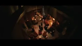 People gathered in dimly lit church — Harry Potter and the Philosophers Stone
