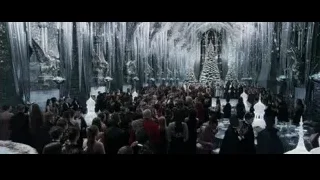 people in banquet hall with Christmas tree — Harry Potter and the Goblet of Fire