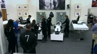 people in control room with large screen — Elon Musk: Return to Space