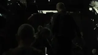 people in dark abandoned room with baby — Blade Runner 2049