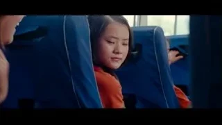 People sitting on bus with window view — The Karate Kid