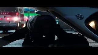 person holding gun in dark room fight — The Amazing Spider Man 2