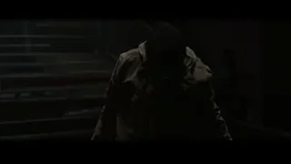 Person in dimly lit room with stairs — The Amazing Spider Man