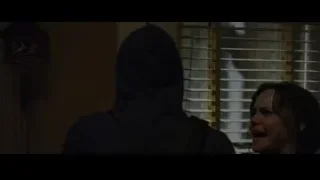 person in hoodie by window — The Amazing Spider Man