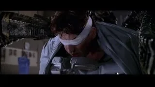 Person lying in distress on metal frame — Spider Man 2