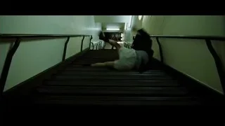 person lying on stairs in hallway — Fight Club