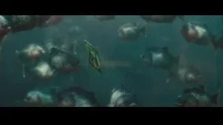 Person standing by large aquarium — Now You See Me