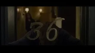 person standing in doorway with number 36 — The Amazing Spider Man