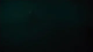 person submerged in dark ocean at night — Blade Runner 2049