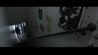 person walking in dark dilapidated hallway — Southpaw
