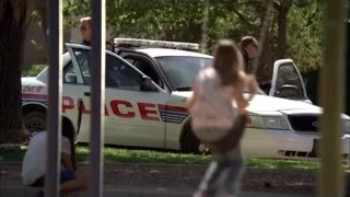 police officers around a hearse on street — Breaking Bad