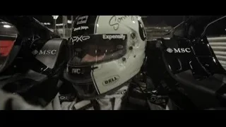 Race car driver in helmet sitting in car — F1