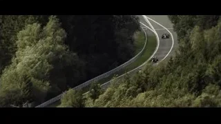 Racing cars on a forested track — F1