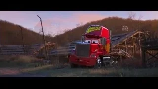 Red truck parked in open field at sunset — Cars 3