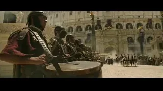 Roman soldiers drumming in front of Colosseum — Gladiator 2