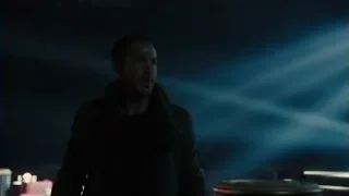 silhouette of man in blue lit room — Blade Runner 2049