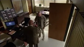 three men in office, one holding camera — Breaking Bad