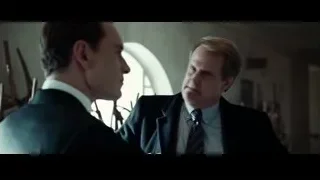two men conversing in a room — Steve Jobs